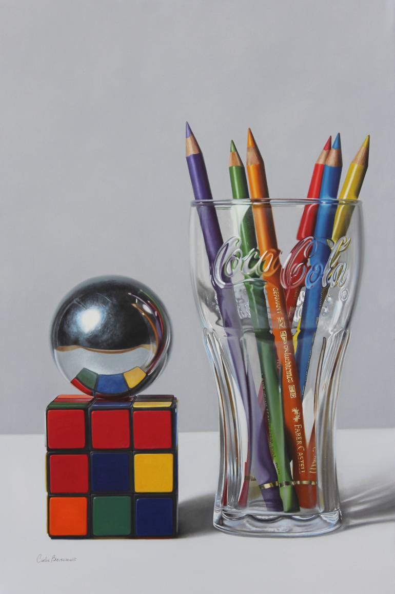 Rubik's cube and glass with pencils