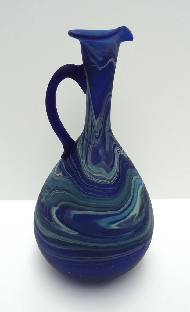 Dark
                  blue pitcher with handle