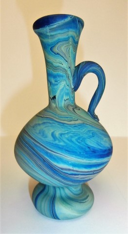 Elongated one handle vase with stand
