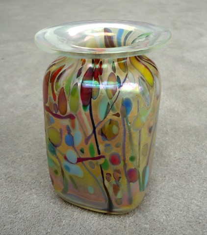 Clear square vase with confetti