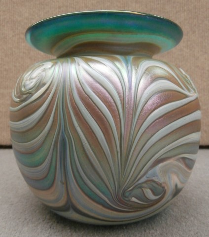 Wide feathered white and green vase with
                      green rim