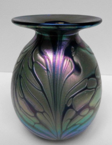 Feathered
                      iridescent blue rim vase