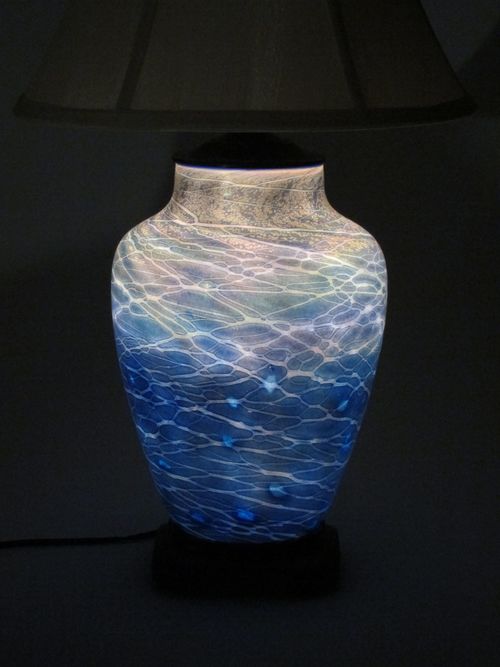 Small lustre
                    lamp in blue with interior illumination detail